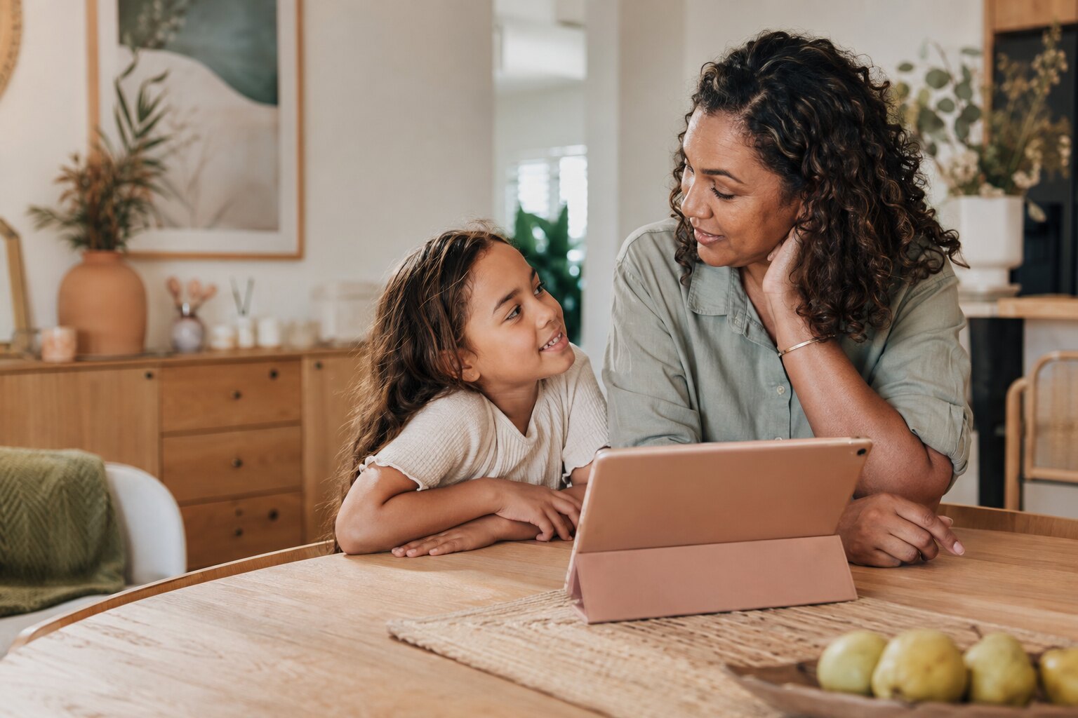 A parent using a calm digital reflection tool while remaining connected with their child